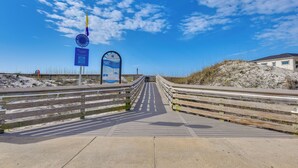 A boardwalk leading to a beach with a clear sky and a flag. - < 1 Mi to Beach: 30A Escape w/ Bikes + Pool Access (Santa Rosa Beach)