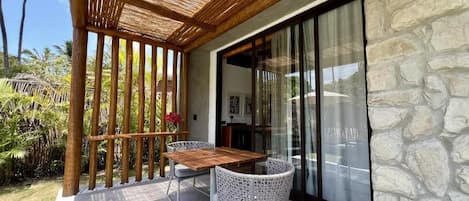 Luxury Bungalow, Lanai, Garden View | Outdoor dining