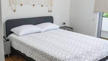 2 dormitorios, tabla de planchar con plancha, wifi y ropa de cama