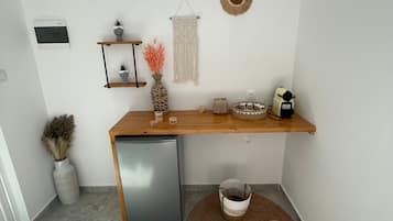 Deluxe Quadruple Room | Living area