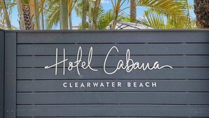 A wooden sign with the text 'Hotel Cabana' and 'CLEARWATER BEACH' indicating the hotel's name and location. - Handicap Accessible Suite in Clearwater Beach (Clearwater)