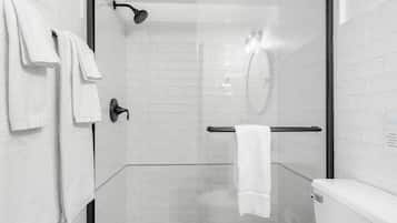Shower, hair dryer, towels, shampoo