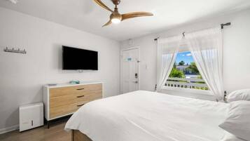1 bedroom, desk, iron/ironing board, travel cot