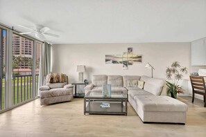 TV, offices - Stunning Ocean Village Escape|Pool & Beach Access (Fort Pierce)