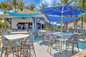 Outdoor dining - Stunning Ocean Village Escape|Pool & Beach Access (Fort Pierce)