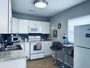 Private kitchen - Totally Rad 90's Two-Bedroom Rental in Downtown Saint Joseph! (Saint Joseph)