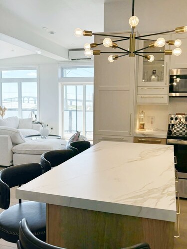 Ocean Front Condo.  Seconds to beach. Includes beach day package with chairs