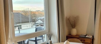 Modern studio with balcony & lake view on the Biggesee