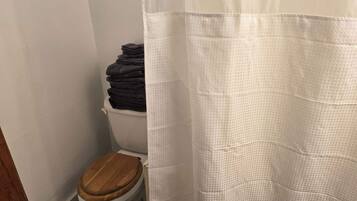 Shower, towels, shampoo