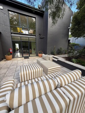 Deluxe Double Room, Courtyard View | Terrace/patio