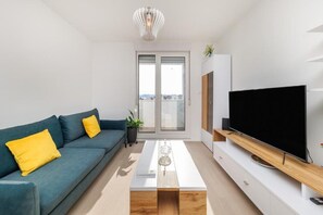 Apartment, Balkon, Stadtblick | Wohnbereich