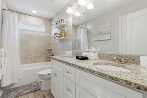 Hair dryer, towels, soap, shampoo