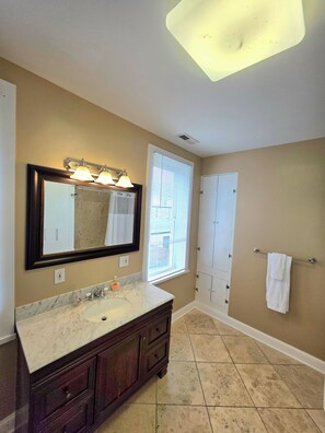 Hair dryer, towels, soap, toilet paper