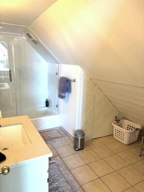 Hair dryer, towels, soap, shampoo