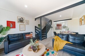 Living area - Budget 2BR Home Convenient Location Walk to Shops (Eight Mile Plains)