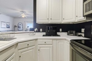 Condo, Multiple Beds, Pool Access (View to a Thrill) | Private kitchen - Modern Condo at 11mm in Sunrise w/ PWC & Boat Slip (Sunrise Beach)