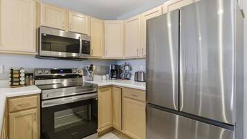 Appartement, meerdere bedden, patio (Martinis on the Ledge) | Privékeuken