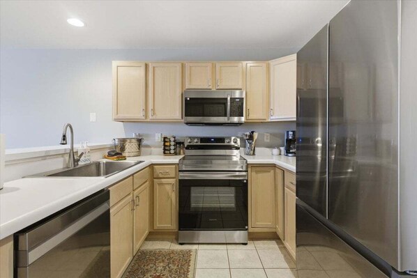 Condo, Multiple Beds, Patio (Martinis on the Ledge) | Private kitchen - Beach Area, 2 Pools, Pet-friendly Condo at 20.5mm (Osage Beach)