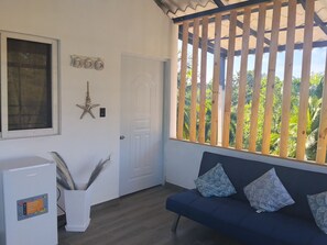 Deluxe Apartment, Balcony, Courtyard View | Living area