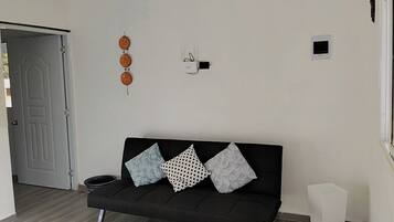 Deluxe Apartment, Balcony, Courtyard View | Living area