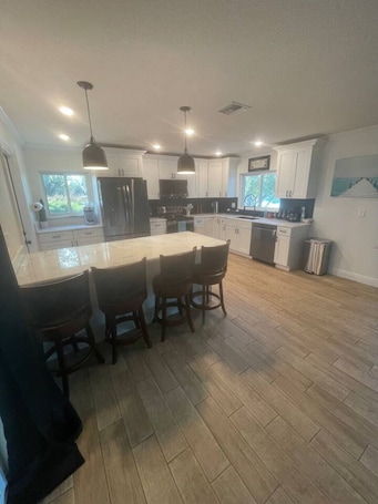 Fridge, microwave, oven, stovetop. Lakefront Pool Retreat • Theater 7.1 • Fishing