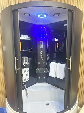 Shower, hair dryer, towels, soap - Two-bedroom apartment in Qasr El Nil district overlooking the Nile River (cairo -downtowwn -Qasr El-Nil District)