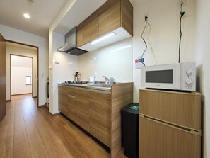 Apartment, 1 Bedroom, Non Smoking | Private kitchen | Full-size fridge, microwave, stovetop, cookware/dishes/utensils - K-Stay TOKYO HANEDA (Tokyo)
