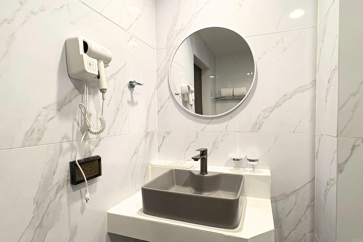 Bathroom | Shower, hair dryer, bidet, towels