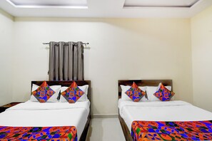 Egyptian cotton sheets, premium bedding, in-room safe, free WiFi - Fabhotel Golden City Inn (Hyderabad)