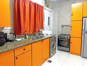 Private kitchen - Two-bedroom apartment in Qasr El Nil district overlooking the Nile River (cairo -downtowwn -Qasr El-Nil District)