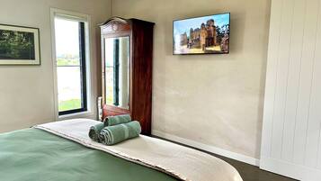 1 bedroom, desk, iron/ironing board, travel cot