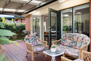 Terrace/patio - Bay Bound Retreat—Beach & City Life by the Airport (Brooklyn Park)