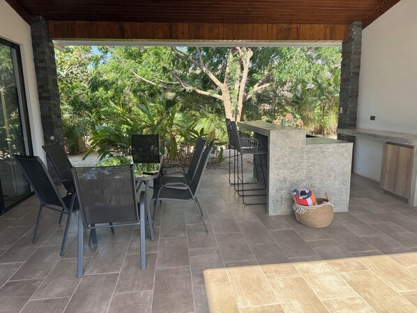 Outdoor dining - In Tamarindo, spacious villa, steps from downtown and the beach. (Tamarindo)