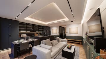 Apartamento premium | Área de estar | TV LCD