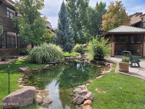 Private Waterfall-View Condo, Luxurious Bedding, Private Patio, Walk to Saloon