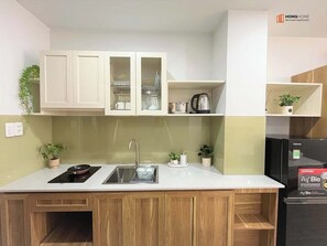 Deluxe Apartment | Private kitchen - HongHome Nami Airport Building (Thanh Pho Ho Chi Minh)