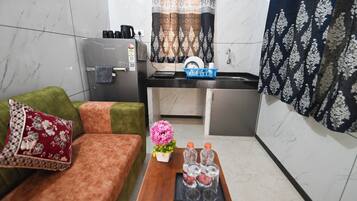 Classic Ac Deluxe 2BHK Family Homestay | Living room