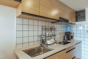 Private kitchen - Studio Apartment with a pool in Ruaka (Ruaka)