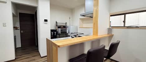 Fridge, microwave, stovetop, cookware/dishes/utensils