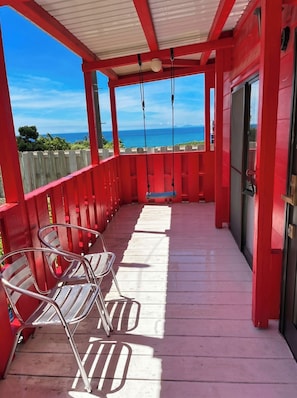 Terrace/patio - Heart Rock is within walking distance A cottage with a view of the Kouri Blue / Kunigami County Okinawa (Kunigami County)