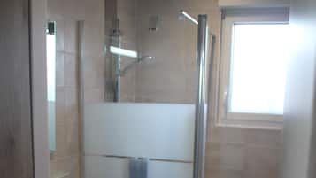 Shower, hair dryer, soap, shampoo