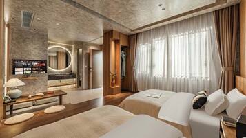 Superior Twin Room, Courtyard View | Living area | 50-inch TV with cable channels