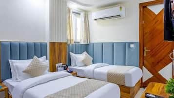 Deluxe Twin Room, City View | In-room safe, soundproofing, iron/ironing board, free WiFi