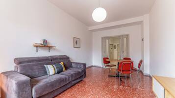 Apartment, Balcony, City View | Living area | Flat-screen TV