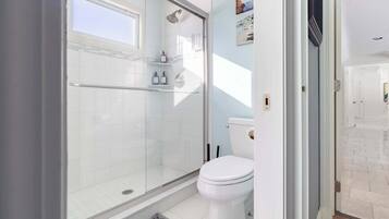 Shower, hair dryer, towels, soap