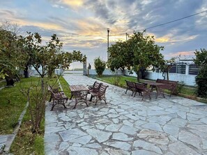 Ferienhaus, 3 Schlafzimmer, Kamin, Meerblick | Speisen im Freien