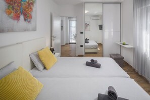 4 slaapkamers, een strijkplank/strijkijzer, wifi, beddengoed