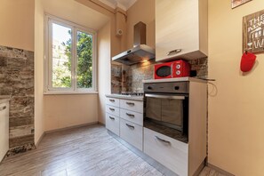 Apartamento luxo, vista para o pátio | Cozinha privada