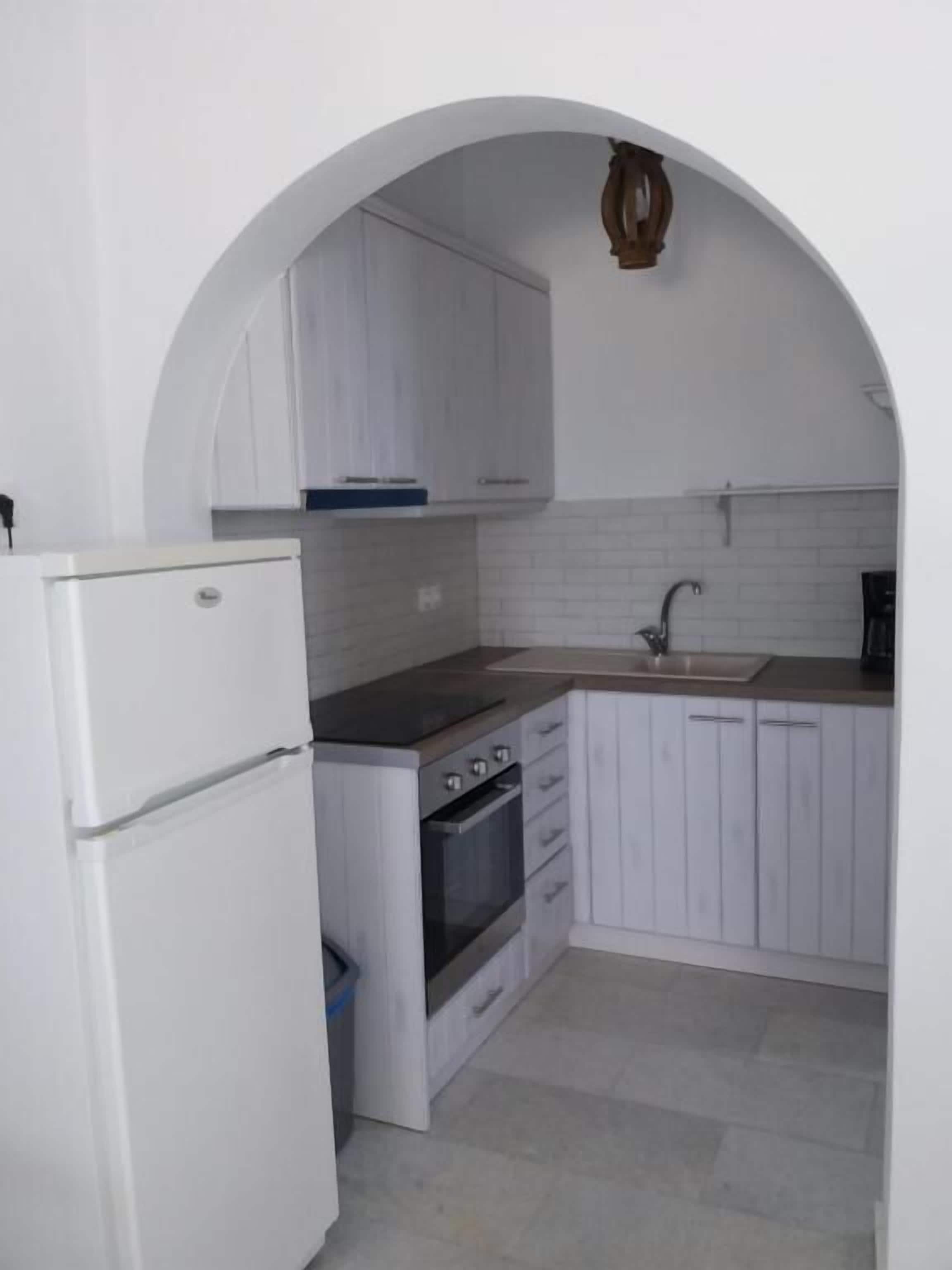 Apartamento familiar, vistas al mar | Cocina privada