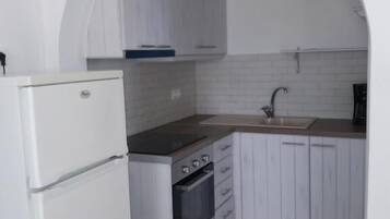 Apartamento familiar, vistas al mar | Cocina privada